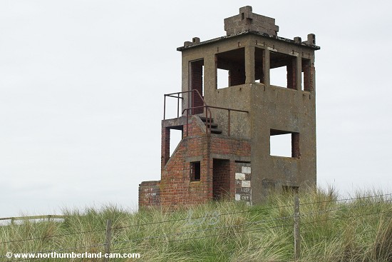 Derelict lookout tower in the dunes.