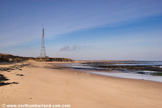 View along the beach beside the moor to Beacon Point.