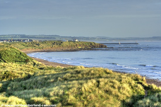 Early summer morning view of the beach at Amble Links.