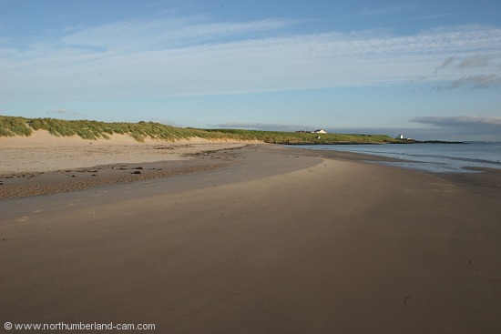 Early summer morning view of Bamburgh Beach.