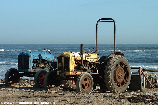 Tractors on the beach.